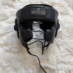 like new society nine galea lace up head gear in black gold S/M